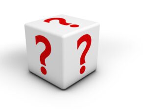 Red question mark icon and symbol on a white cube concept for web faq and business contact center support on white background.